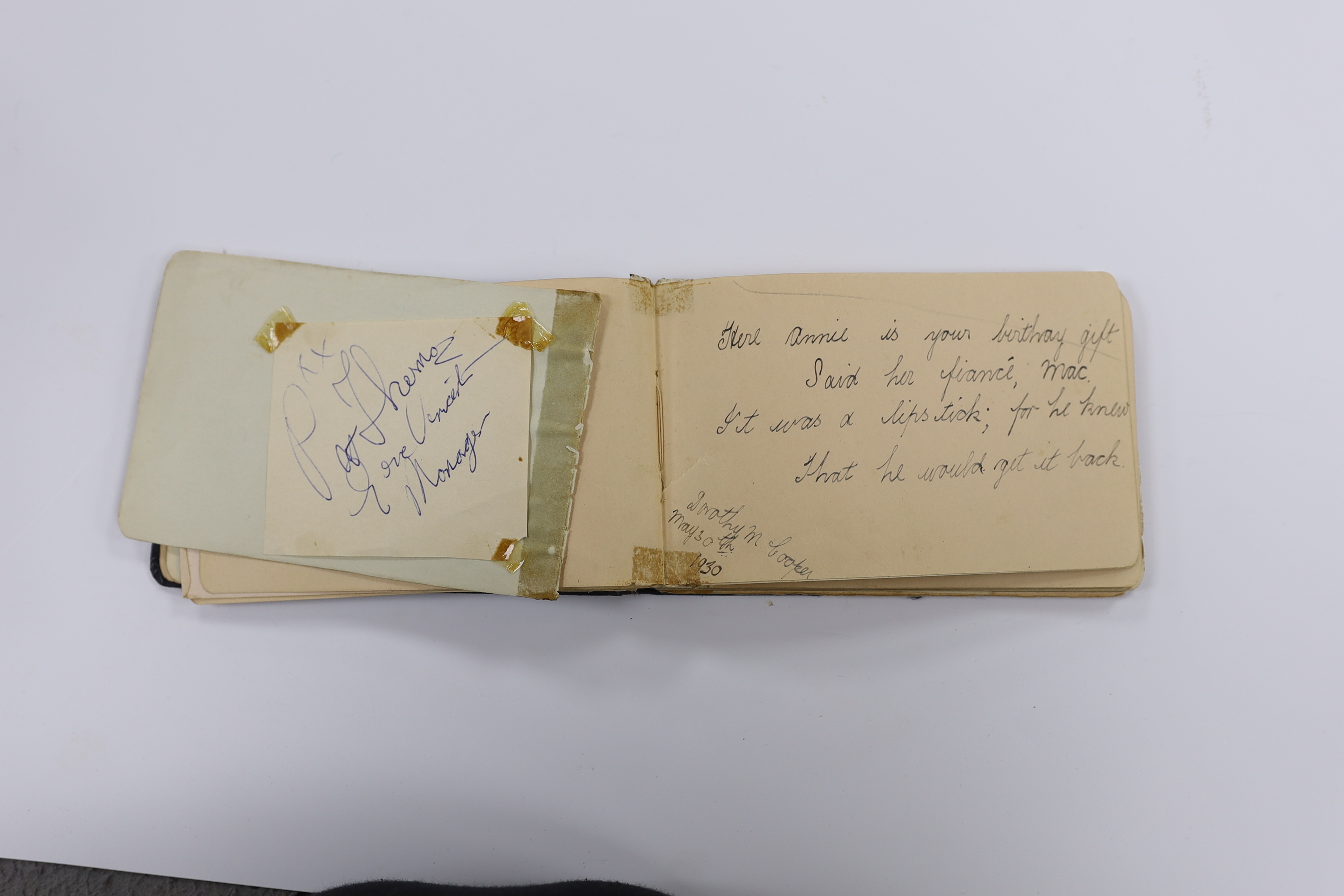 Two albums of early 20th century postcards and black and white photographs, many with naval interest, including photographs of battleships, and naval manoeuvres, during the 1930s, scenes of Bermuda, portraits of soldiers